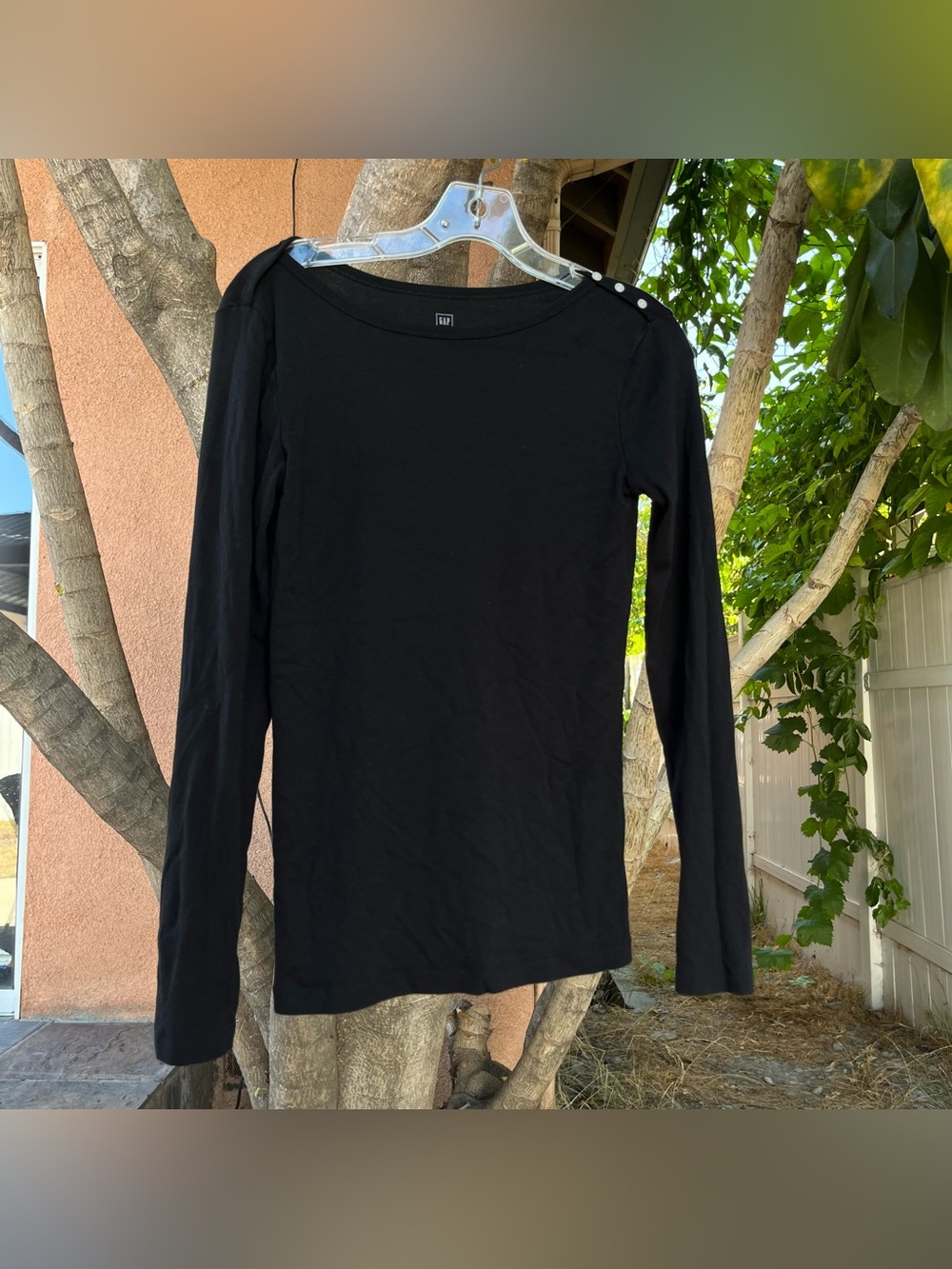 Gap 2010 Black Long Sleeves with Buttons on the Shoulder and Sleeves.